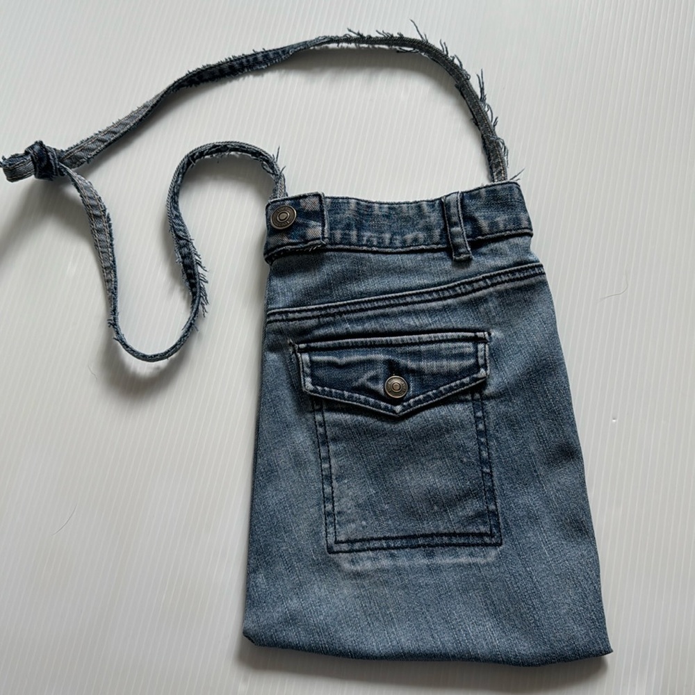 Up cycled denim crossbody bag.
